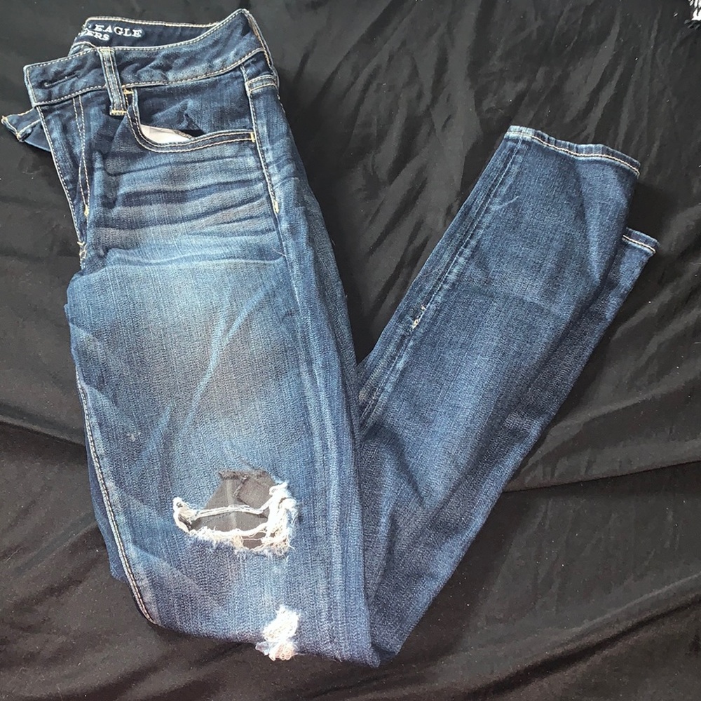 American Eagle ripped dark blue jeans